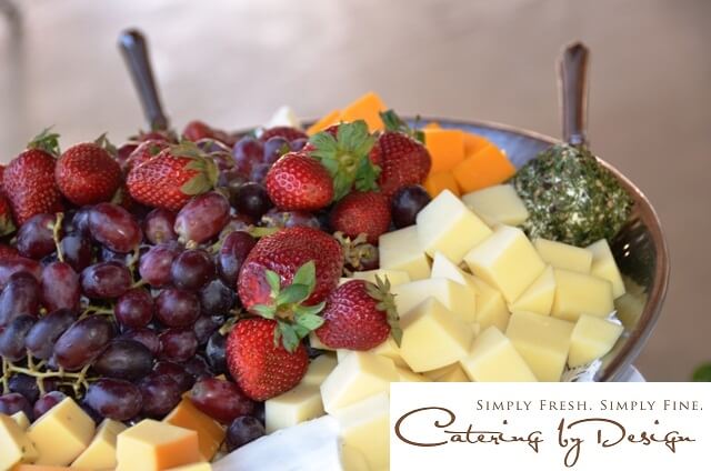 Colorful and delicious cheeses and fresh fruit